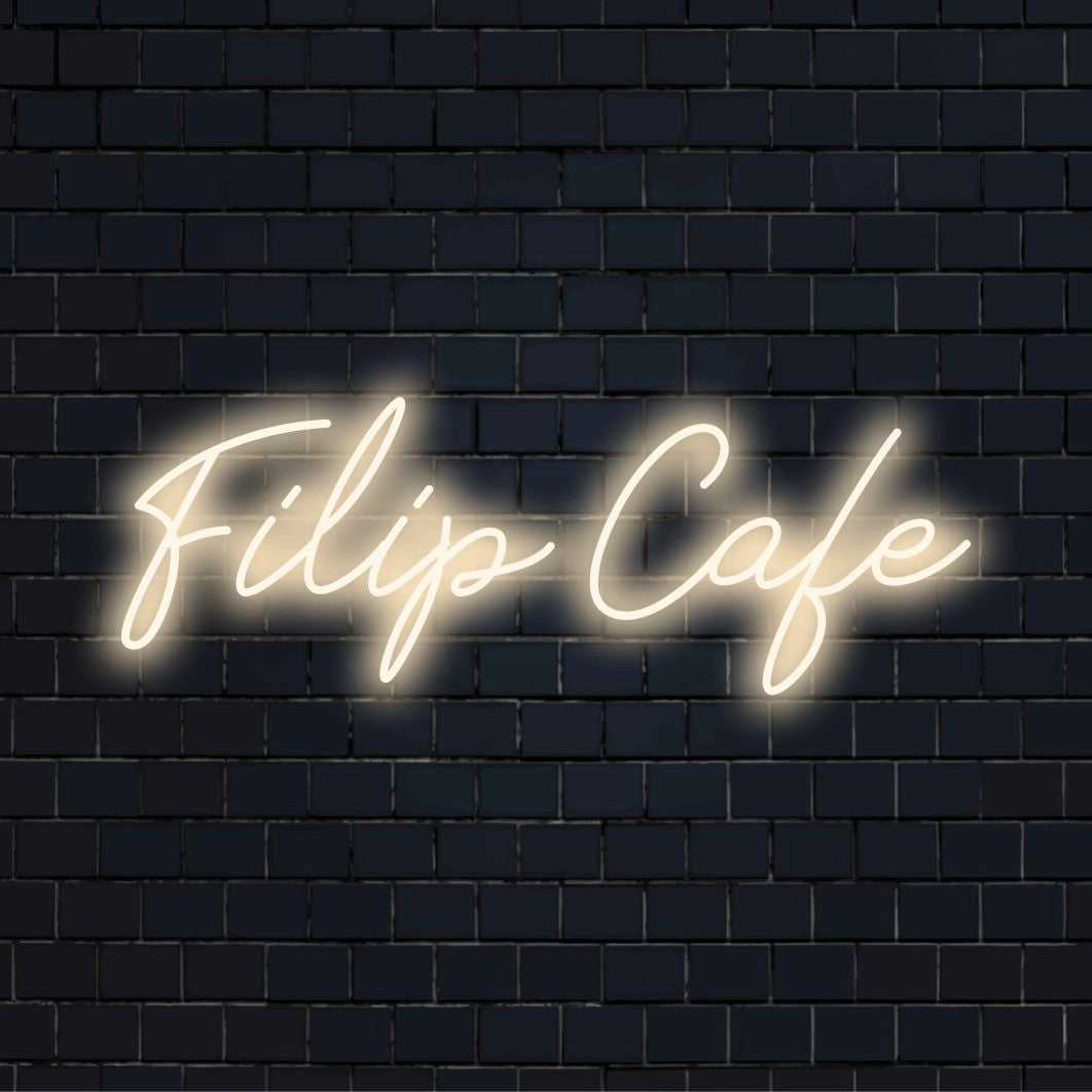 Filip Cafe Custom Name Neon Sign, bright LED glow on dark brick wall