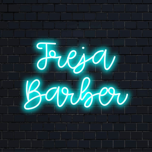 Freja Barber Personalized Neon Light with bright neon lettering on dark brick background