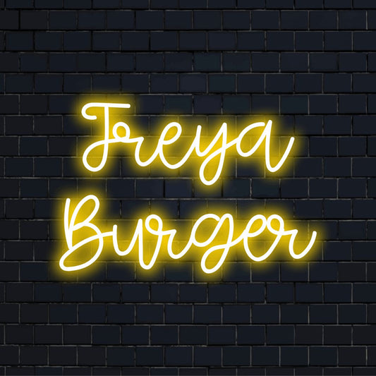 Freya Burger Custom Name Neon Sign, glowing neon text on dark brick wall