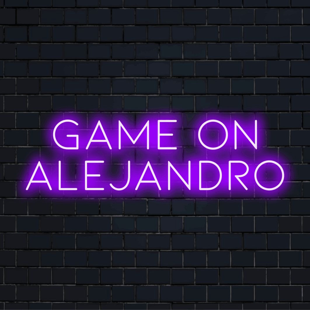 Game On Alejandro Personalized LED Neon Sign, bright neon lettering on dark brick background