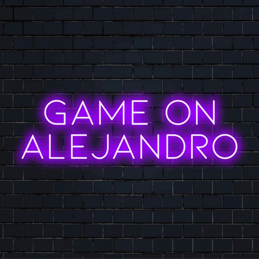 Game On Alejandro Personalized LED Neon Sign, bright neon lettering on dark brick background