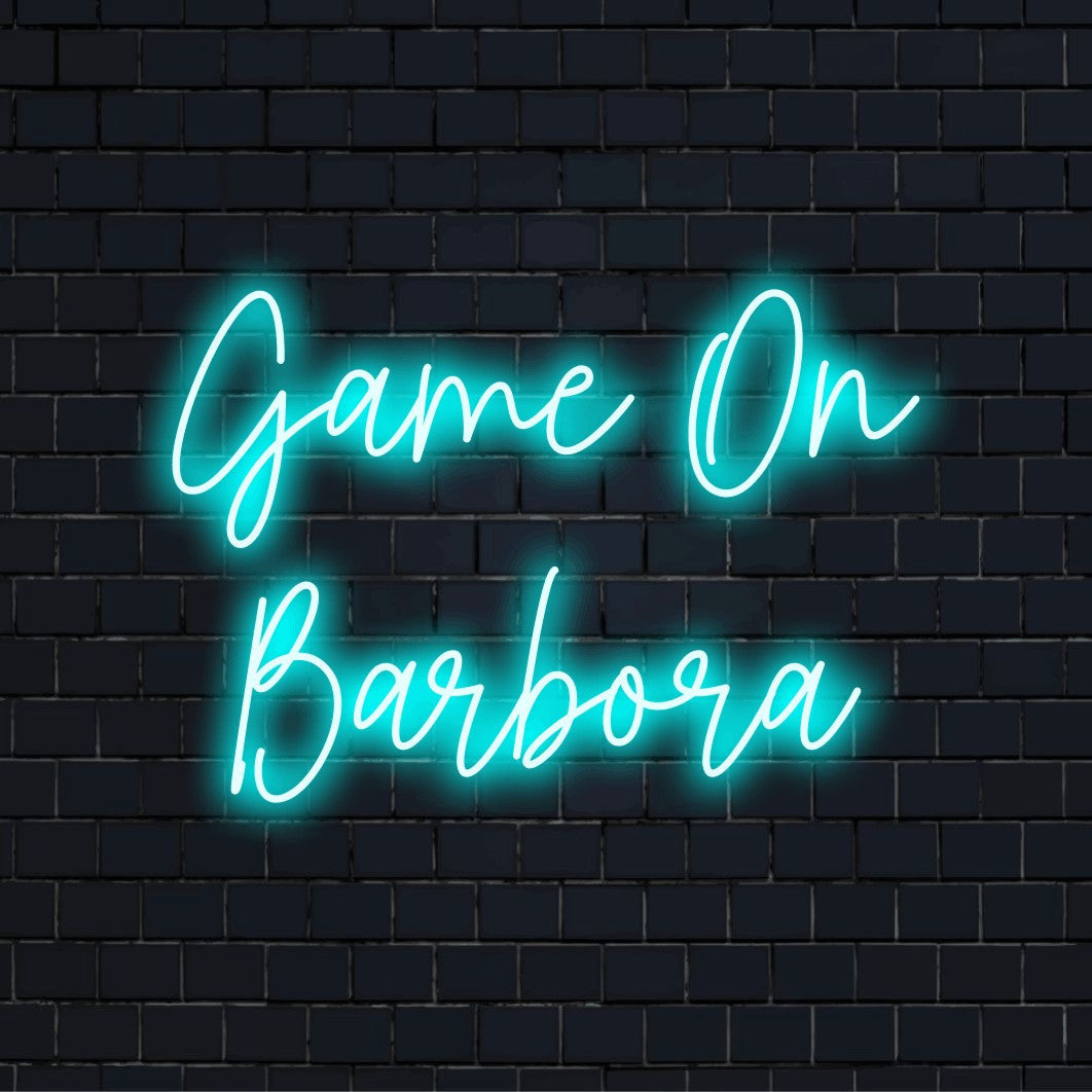 Game On Barbora Custom Name Neon Sign, glowing neon text on dark brick background