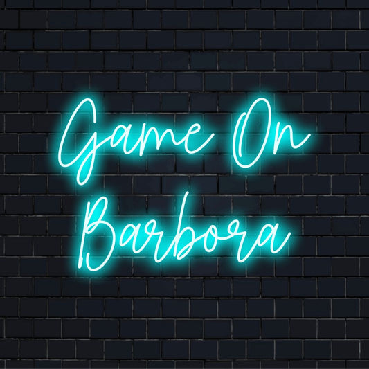 Game On Barbora Custom Name Neon Sign, glowing neon text on dark brick background