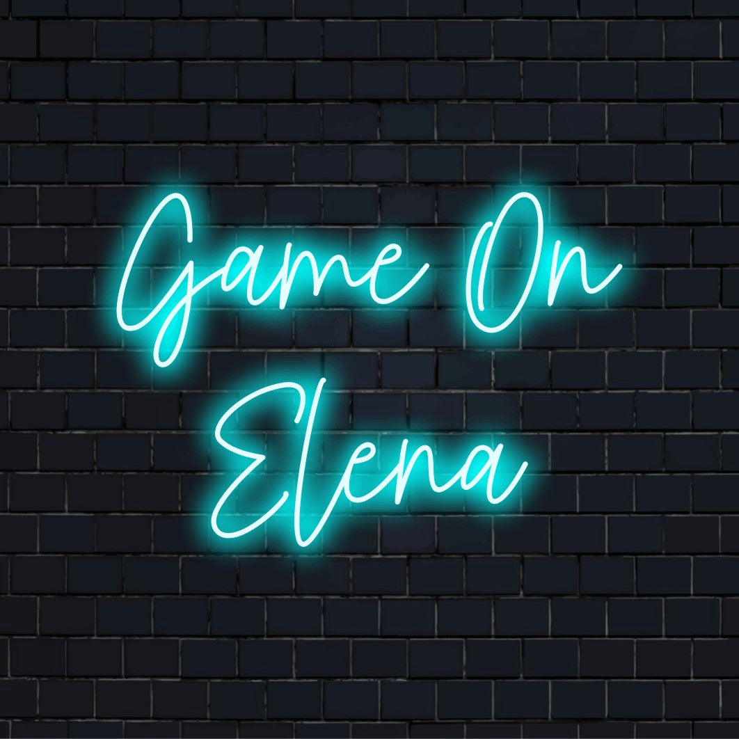 Game On Elena Custom Name Neon Sign, glowing lettering on black brick background