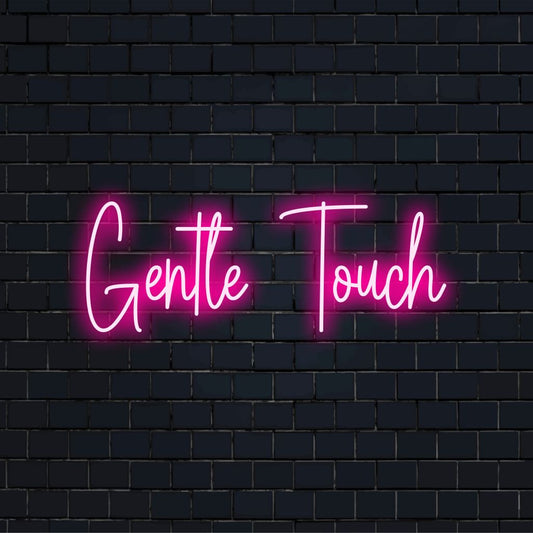 Gentle Touch Neon Sign, bright neon glow on dark brick wall