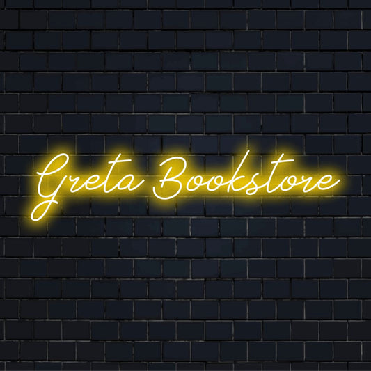 Greta Bookstore Custom Name Neon Sign, bright LED glow against black brick wall