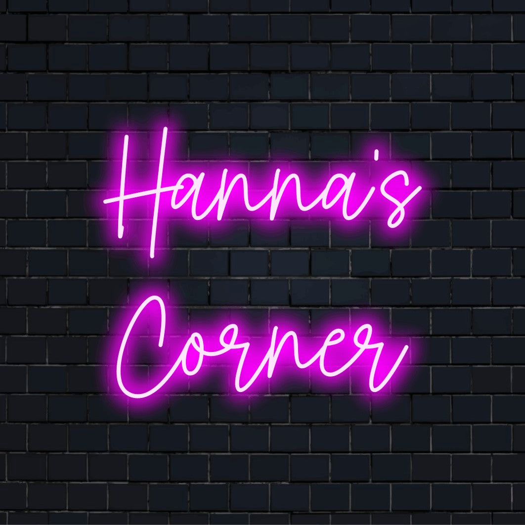 Hanna_s Corner Custom Name Neon Sign, soft neon glow against brick backdrop