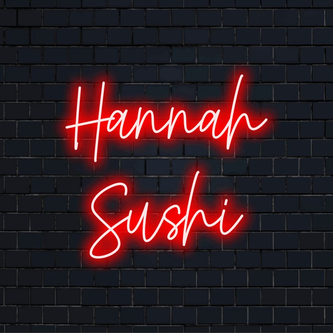 Hannah Sushi Custom Name Neon Sign, bright neon glow against black brick wall