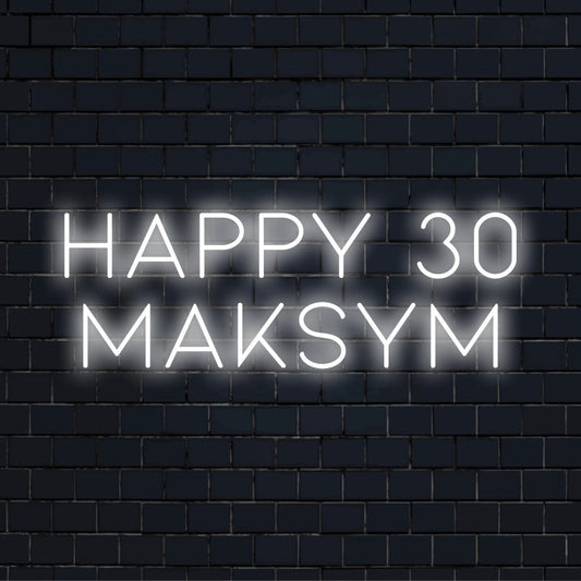 Happy 30 Maksym Personalized Neon Light with bright neon lettering against black brick wall