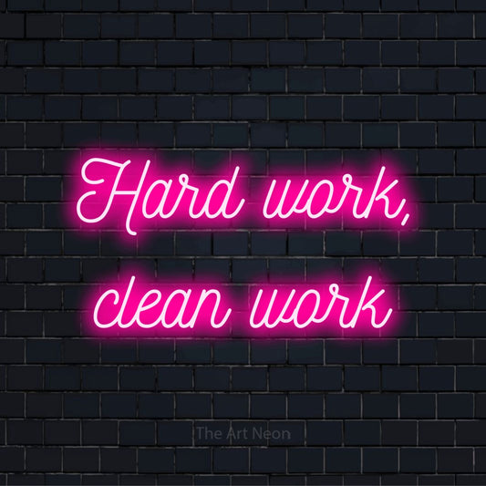 "Hard Work, Clean Work" LED neon sign on a black brick wall