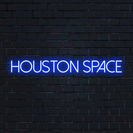 Houston Space Neon Sign, bright LED glow on dark brick background