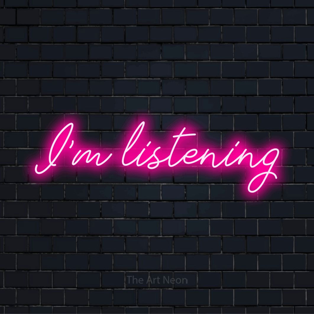 "I’m Listening" glowing LED neon sign on a black brick wall