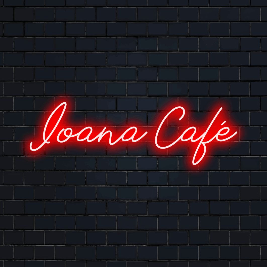 Ioana Cafe Custom Name Neon Sign, bright neon lettering on dark brick wall