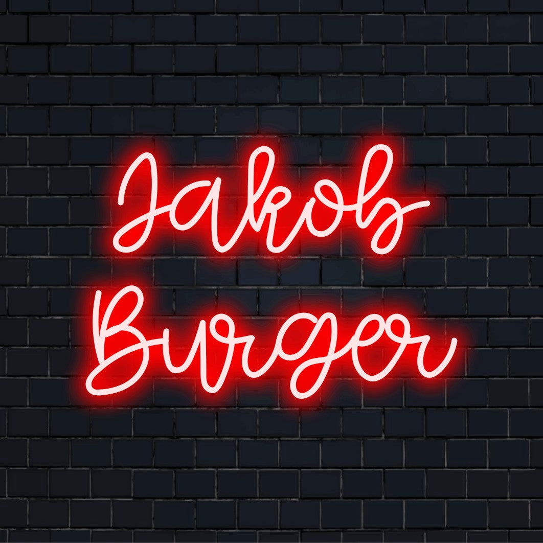 Jakob Burger Personalized LED Neon Sign, soft neon glow on dark brick wall