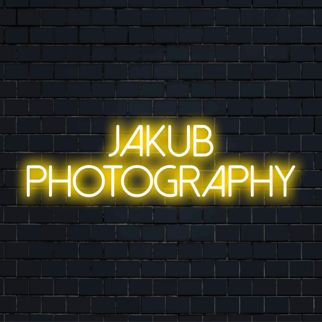 Jakub Photography Personalized LED Neon Sign, bright neon lettering on dark brick background