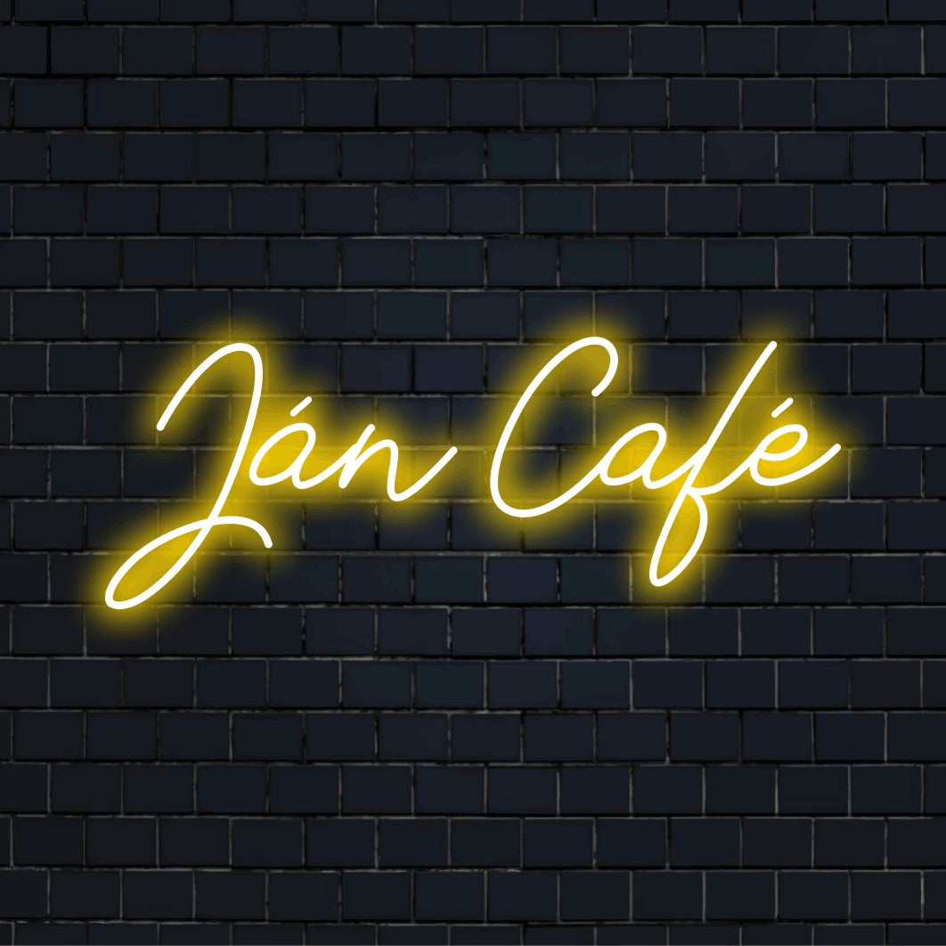 Jan Cafe Custom Name Neon Sign, bright LED glow on dark brick wall