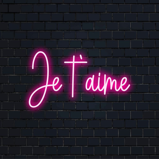 Je Taime Neon Sign, glowing wall decor against brick backdrop