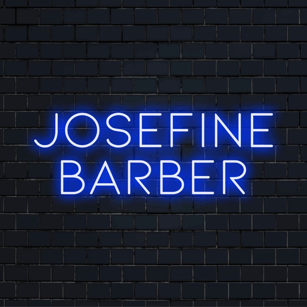 Josefine Barber Personalized LED Neon Sign, glowing neon text on black brick background
