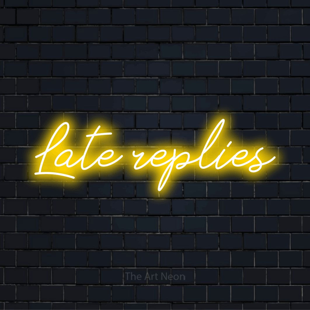 "Late Replies" script-style LED neon sign on a black brick wall