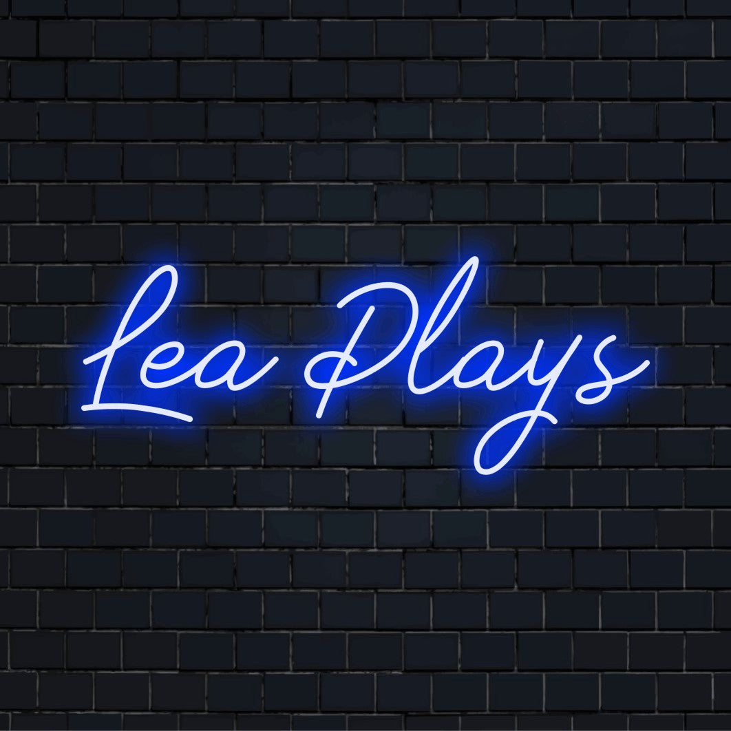 Lea Plays Custom Name Neon Sign, glowing wall decor on black brick background