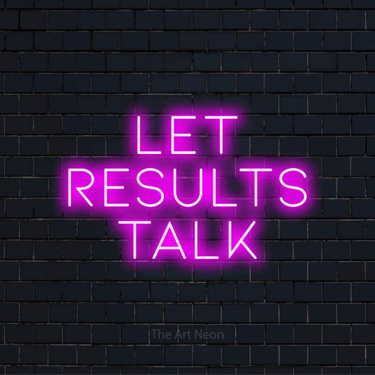 "Let Results Talk" LED neon sign on a black brick wall
