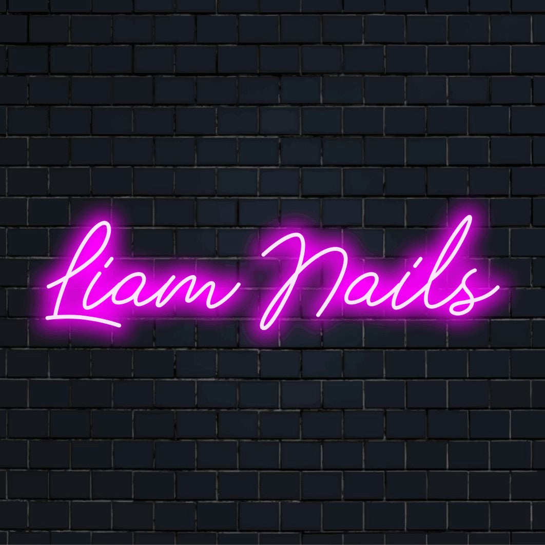 Liam Nails Personalized Neon Light with soft neon glow on dark brick wall