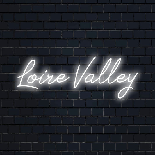 Loire Valley Neon Sign, soft neon glow on black brick background