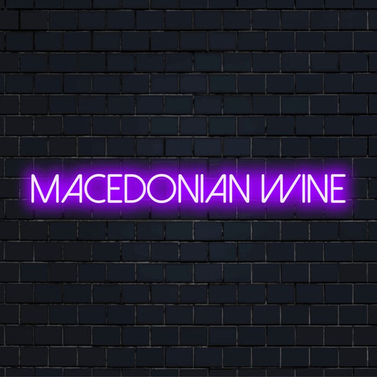 Macedonian Wine Neon Sign, bright neon glow against black brick wall
