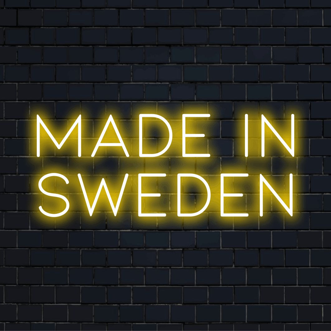 Made In Sweden LED Neon Sign, bright LED glow on dark brick background