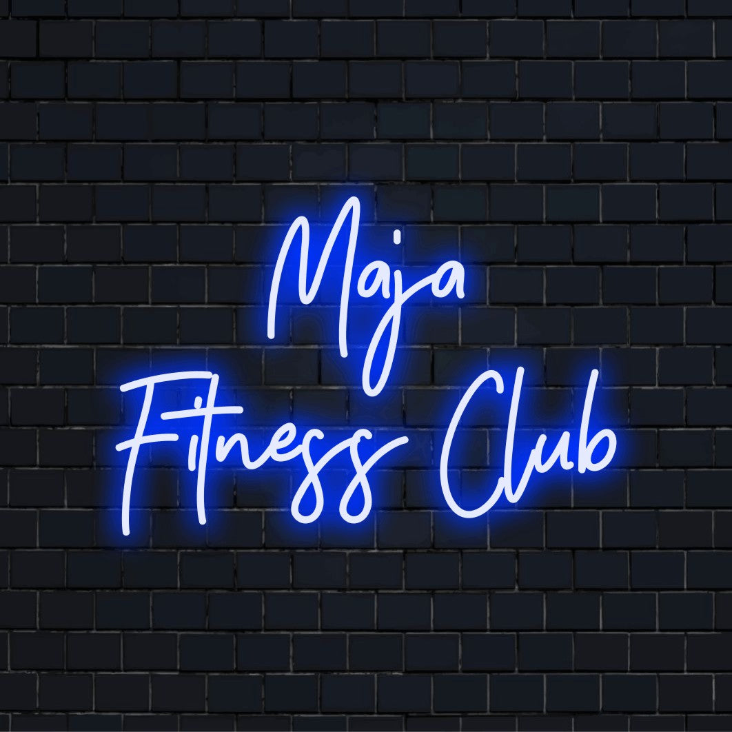 Maja Fitness Club Custom Name Neon Sign, bright neon lettering on dark brick wall