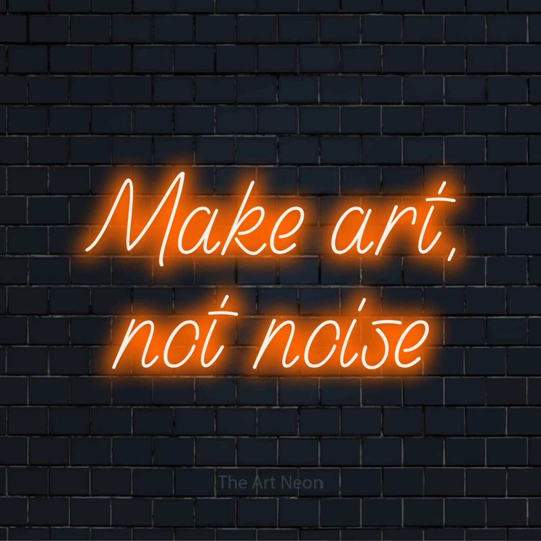 "Make Art, Not Noise" LED neon sign on a black brick wall