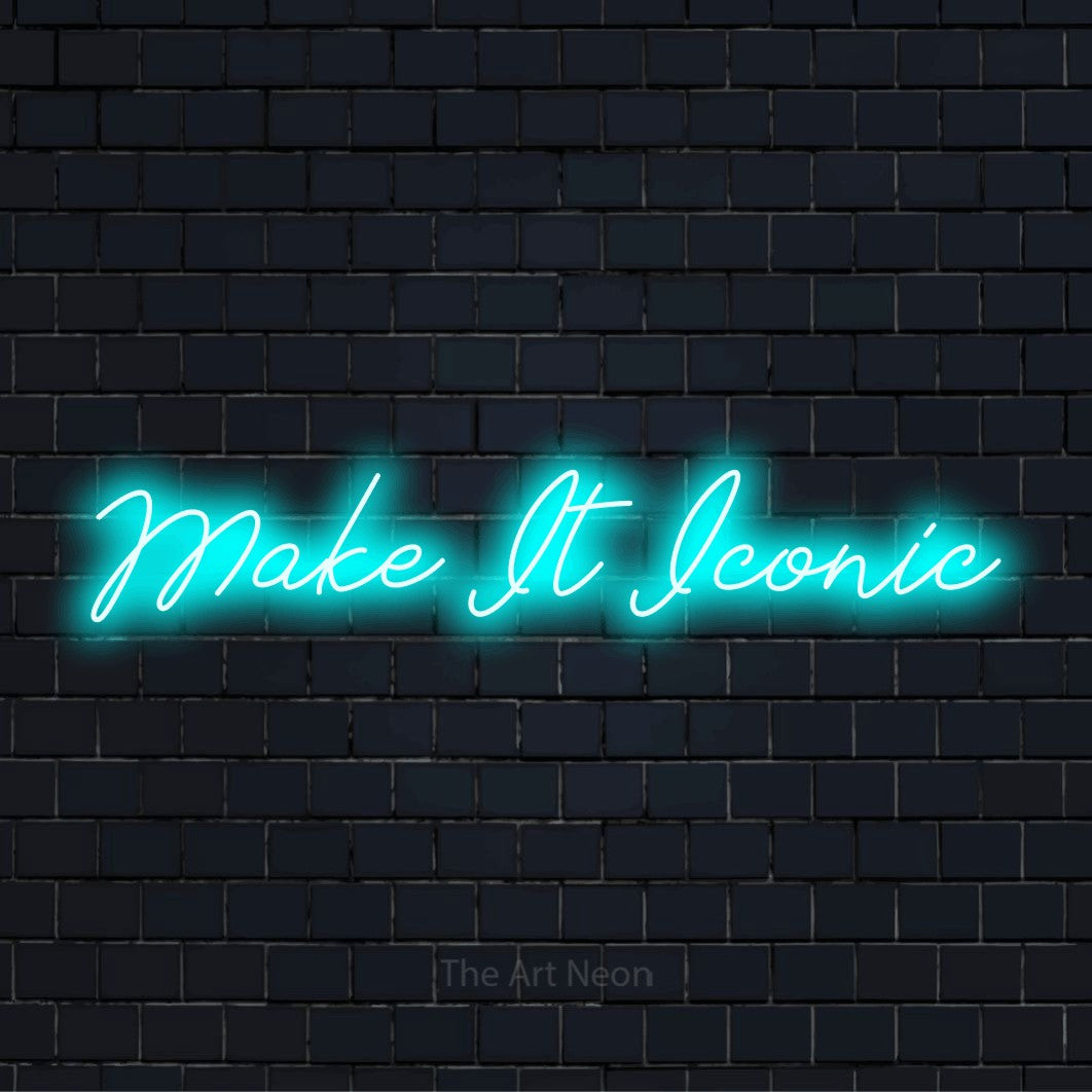 "Make It Iconic" glowing LED neon sign on a black brick wall