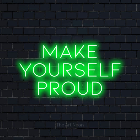 "Make Yourself Proud" neon text design on a black brick wall