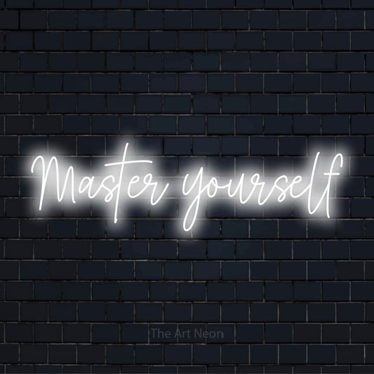 "Master Yourself" glowing LED neon sign on a black brick wall