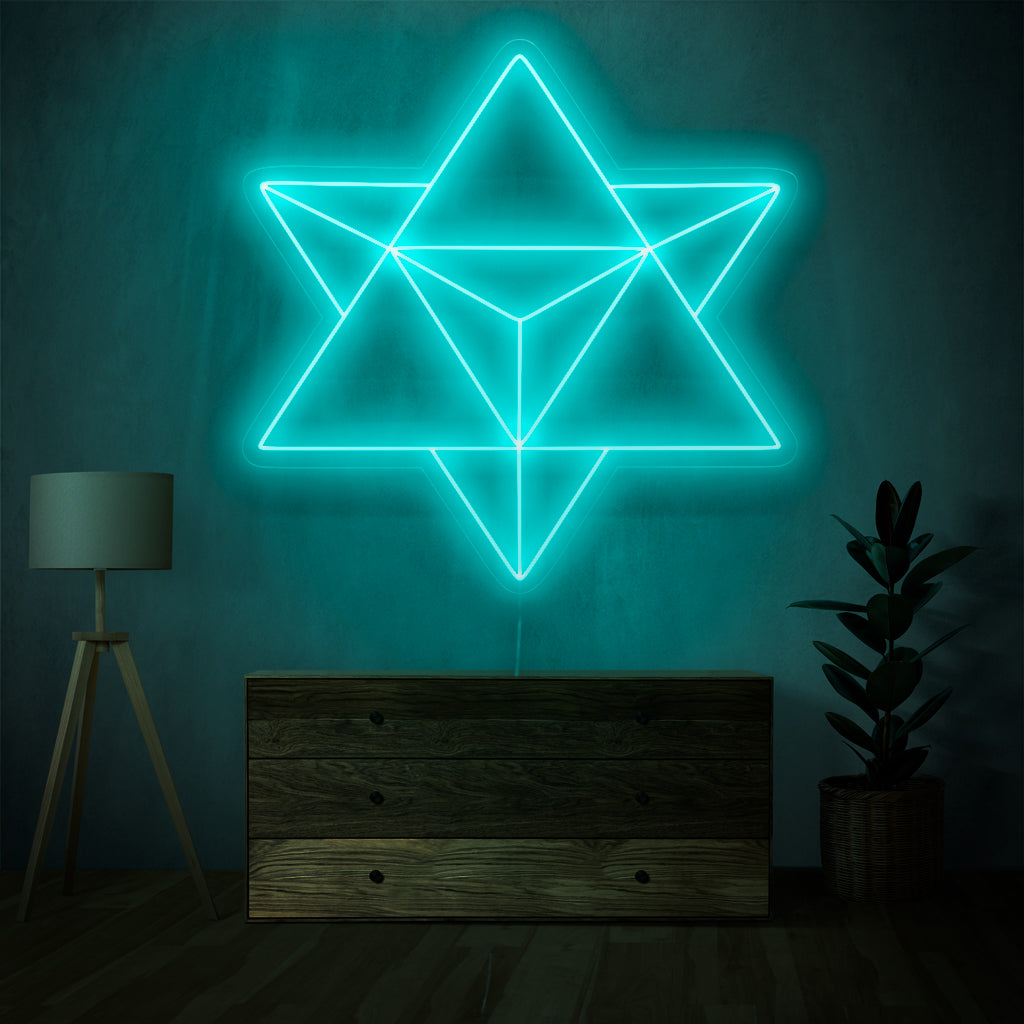 Neonskylten Merkaba är ett transcendent tillägg till inredning med andligt tema, som utstrålar en känsla av gudomlig energi och avger ett fängslande ljus.