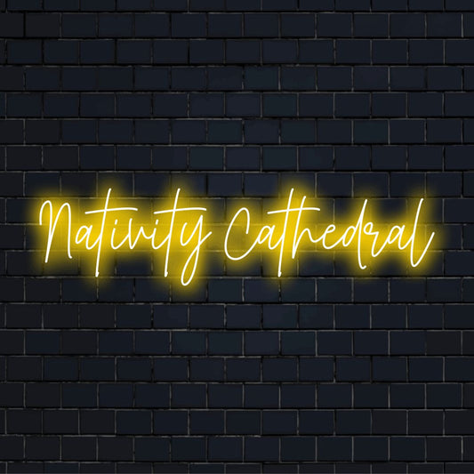 Nativity Cathedral Neon Sign, bright LED glow against brick backdrop