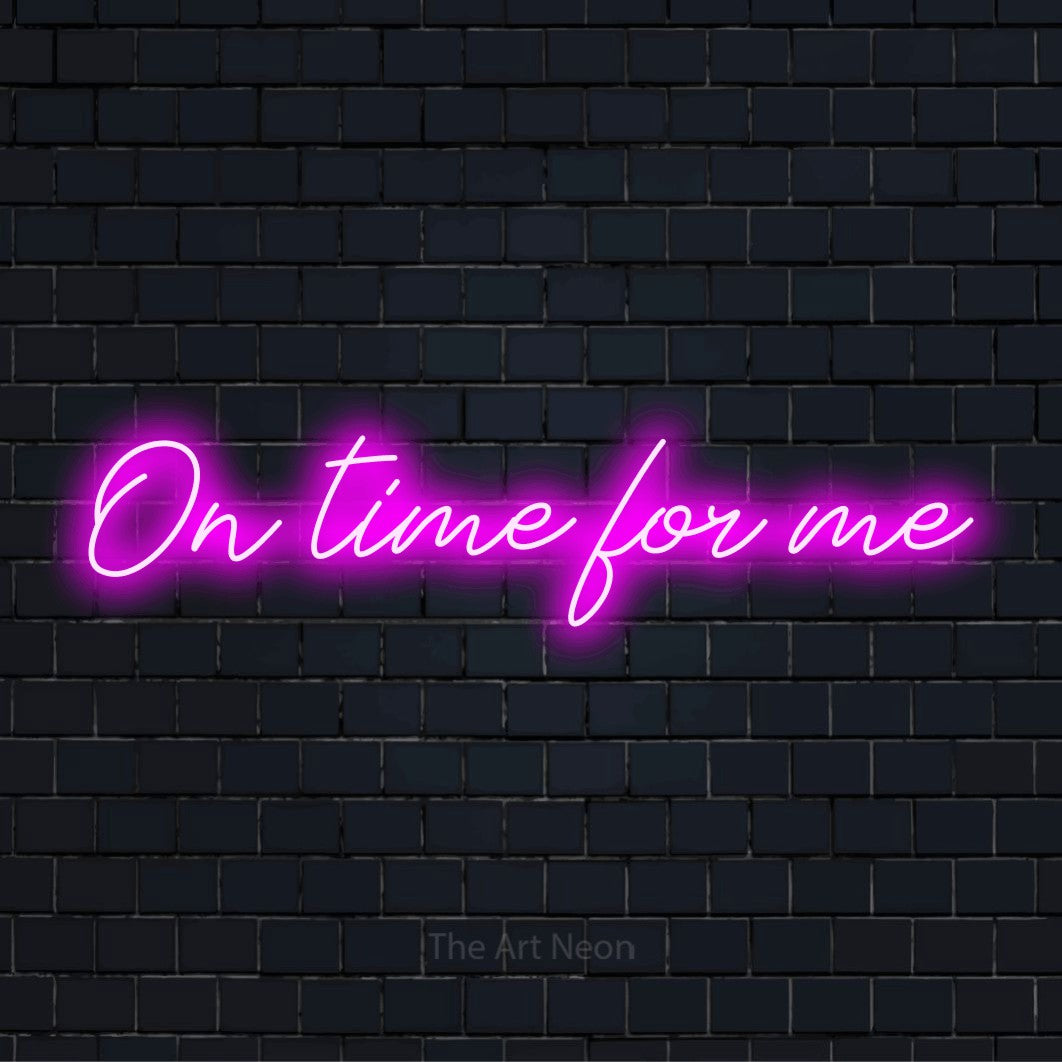 "On Time For Me" text design with neon effect on a black brick wall