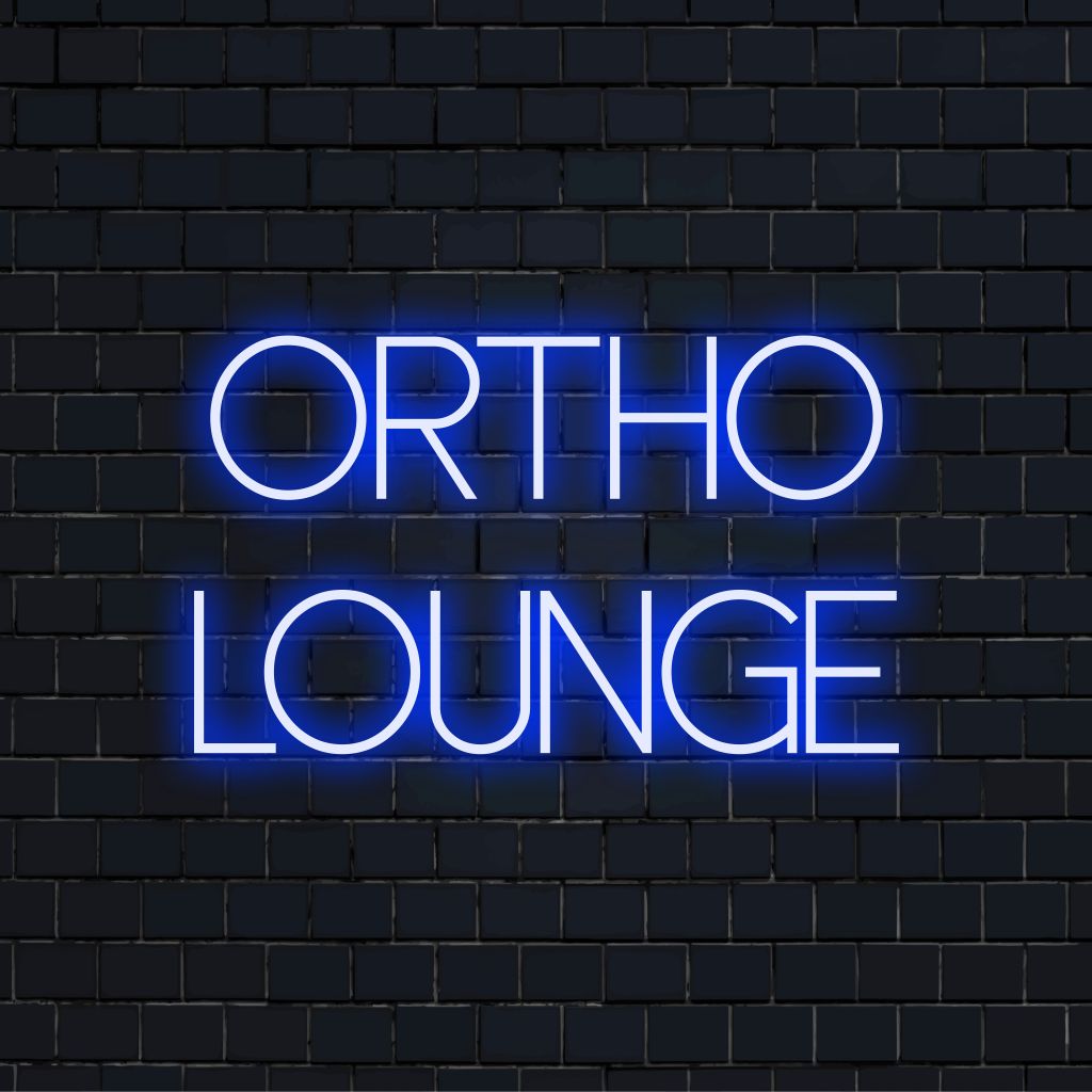 Ortho Lounge Neon Sign, bright LED glow on dark brick background