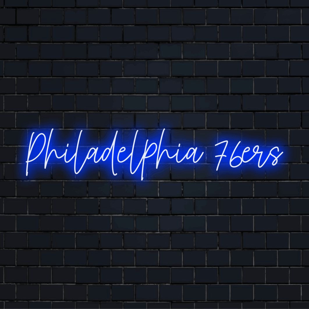 Philadelphia 76ers Neon Sign, bright neon lettering against brick backdrop