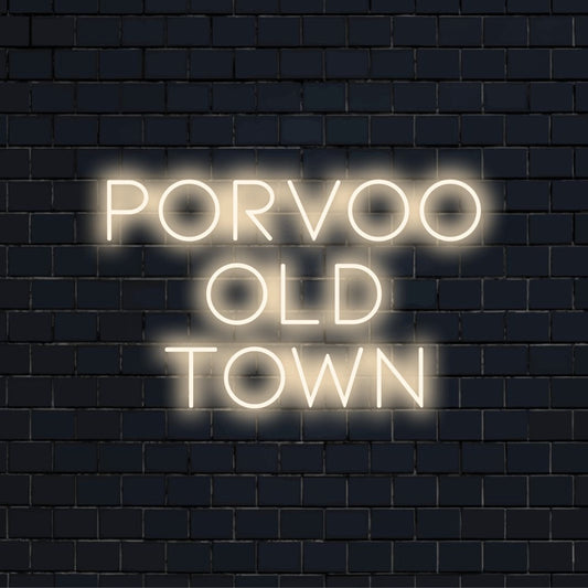 Porvoo Old Town Neon Sign, bright LED glow on dark brick wall