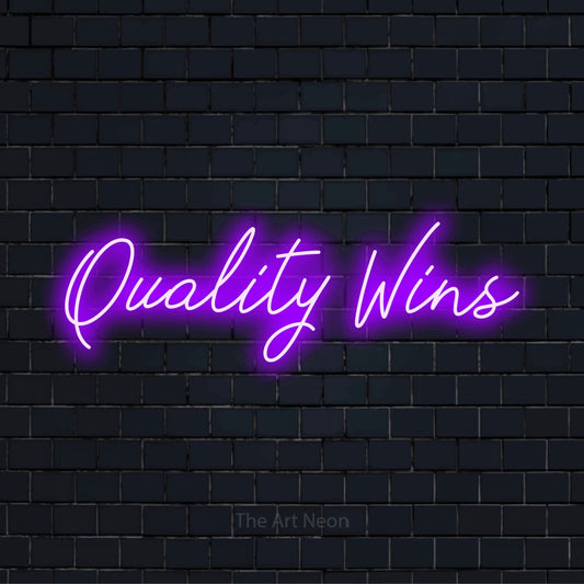 "Quality Wins" LED neon sign on a black brick wall