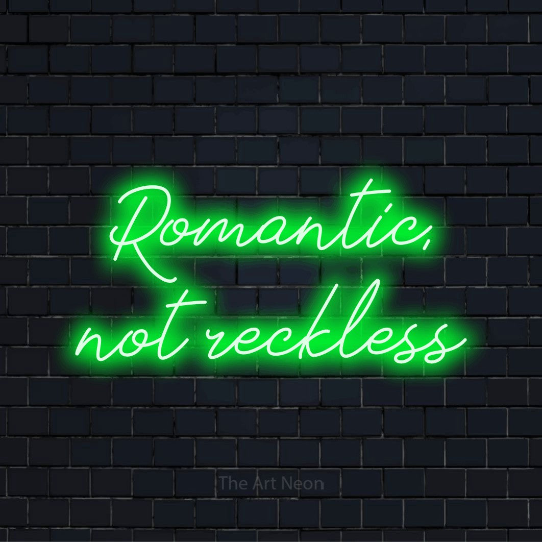 "Romantic, Not Reckless" text design with neon effect on a black brick wall