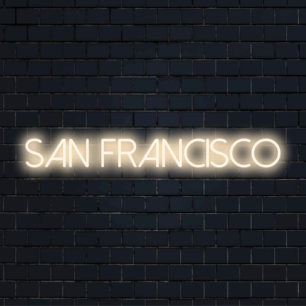 San Francisco Neon Sign, bright LED glow against black brick wall