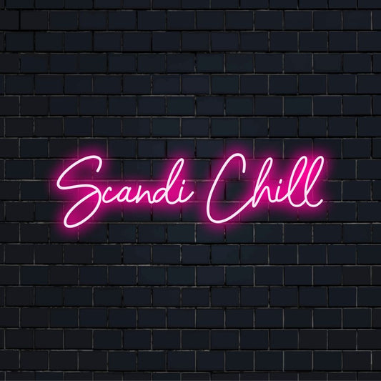 Scandi Chill Neon Sign, bright neon glow against black brick wall
