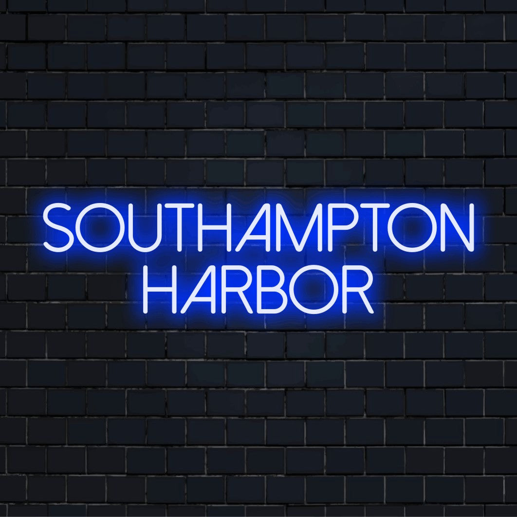 Southampton Harbor Neon Sign, neon text light on dark brick wall