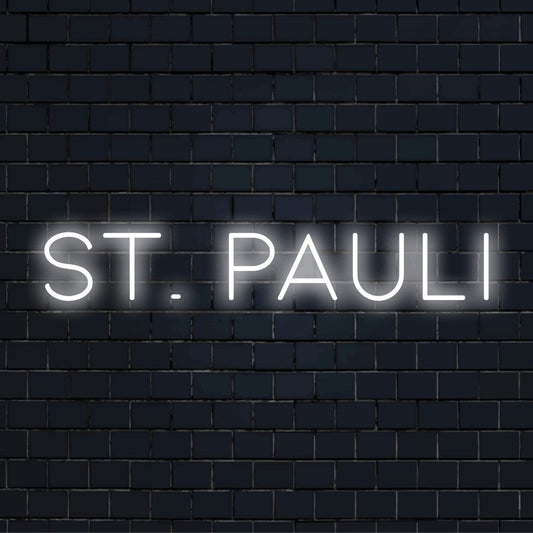 St Pauli Neon Sign, bright neon glow on black brick background