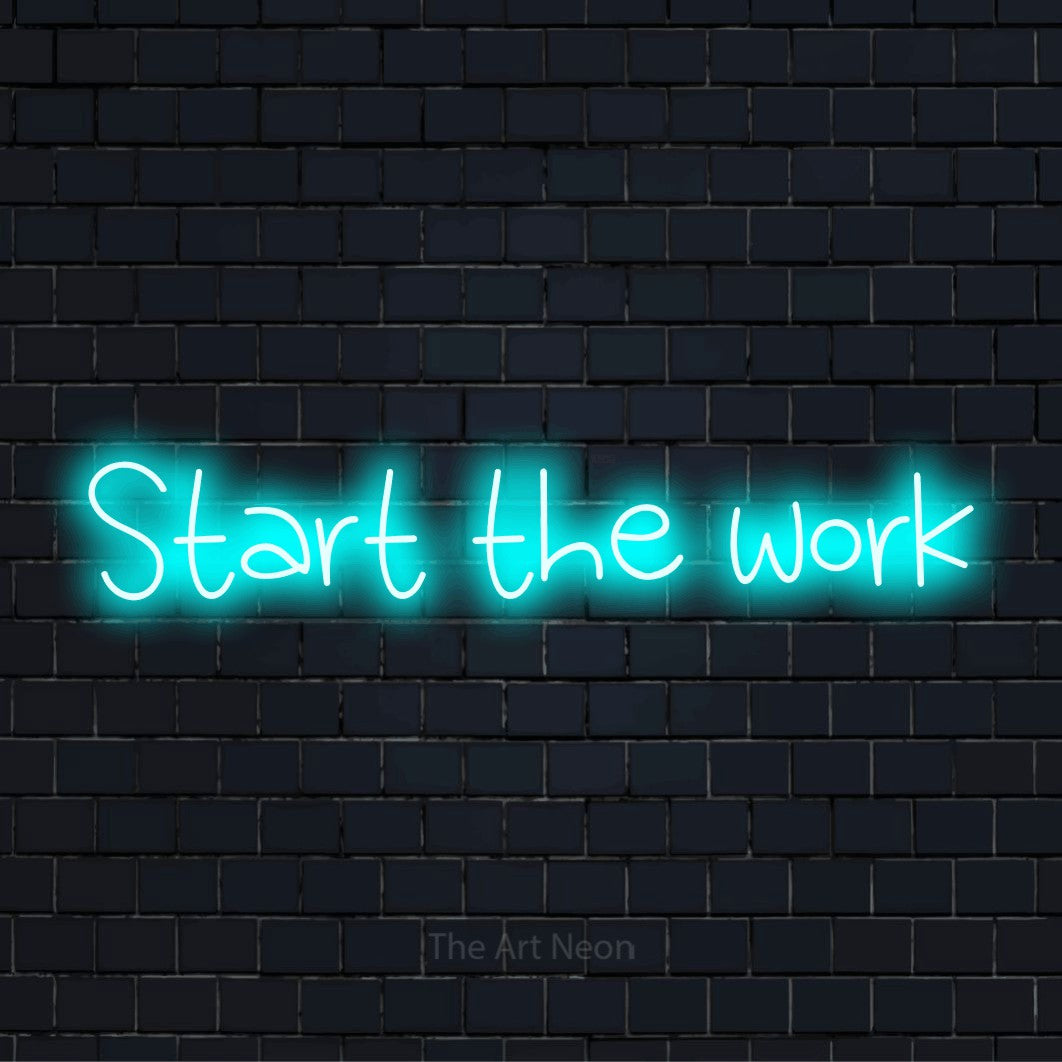 "Start The Work" neon text design on a black brick wall