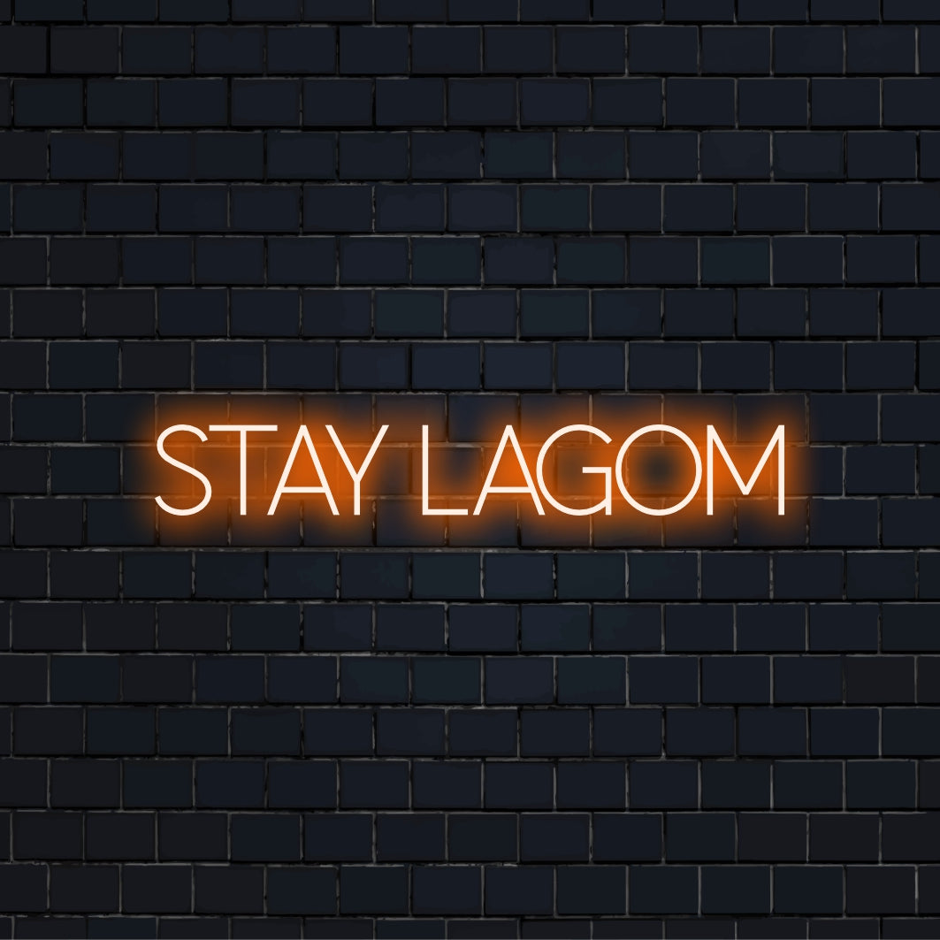 Stay Lagom LED Neon Sign, glowing neon text against brick backdrop