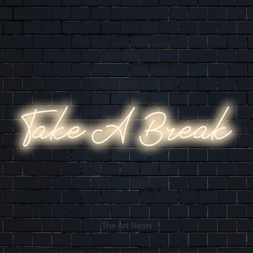 "Take A Break" glowing LED neon sign on a black brick wall