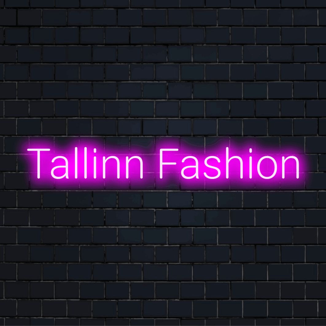 Tallinn Fashion Neon Light with bright neon lettering on dark brick background